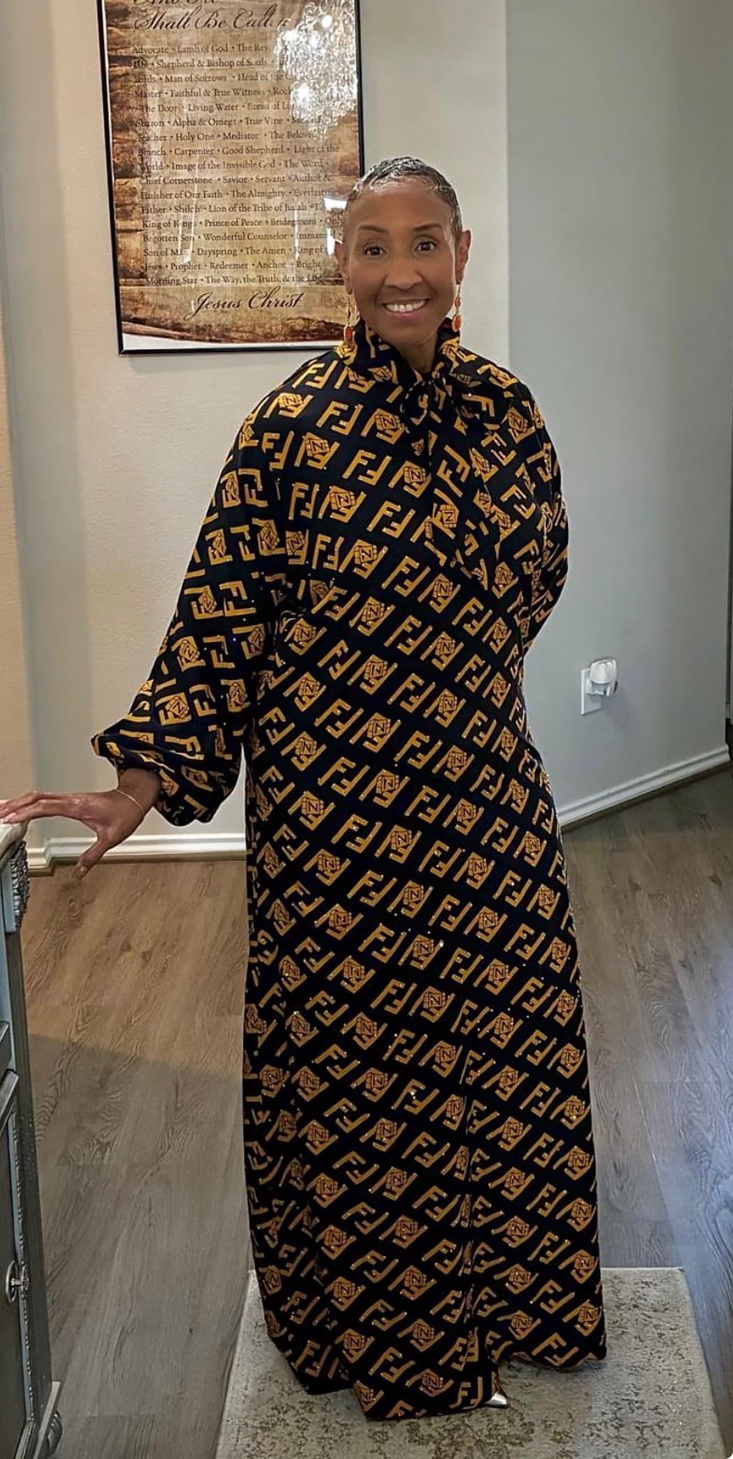 Fendi-inspired luxury maxi dress worn by QueenMother Donna Adibe, Houston boutique